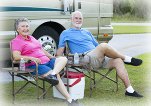 Photo of couple outside their RV